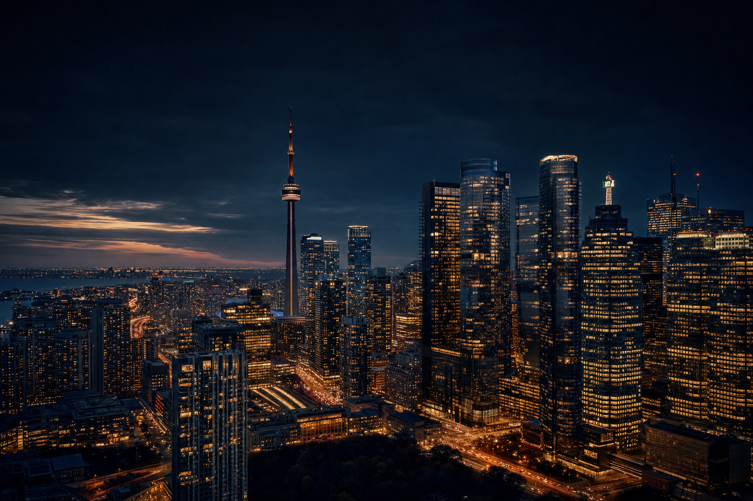 Toronto skyline glowing at dusk